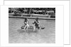1930s 1940s couple drinking while floating in a pool on a rubber raft at florida resort by Anonymous