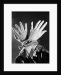 1930s woman's hands tied together by rope overhead view by Anonymous
