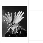 1930s woman's hands tied together by rope overhead view by Anonymous