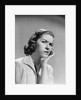 1950s 1960s woman portrait worried facial expression hand to cheek tooth pain by Anonymous