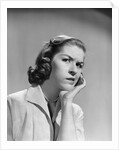 1950s 1960s woman portrait worried facial expression hand to cheek tooth pain by Anonymous