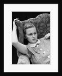 1930s woman sitting slumped position with a worried expression and a furrowed brow by Anonymous