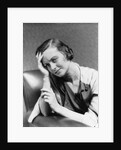 1930s 1940s woman sitting in chair worried sad expression one hand up to her forehead by Anonymous