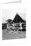 1930s three teen girls doing exercise in a row with arms extended by tent summer camp by Anonymous