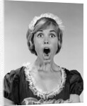 1960s woman in maid uniform eyes and mouth wide open looking at camera by Anonymous