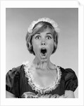 1960s woman in maid uniform eyes and mouth wide open looking at camera by Anonymous