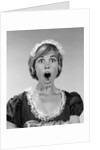 1960s woman in maid uniform eyes and mouth wide open looking at camera by Anonymous