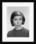 1960s woman portrait looking at camera asking question wonder puzzled funny face expression by Anonymous