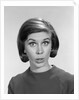 1960s woman portrait looking at camera asking question wonder puzzled funny face expression by Anonymous