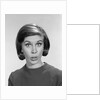 1960s woman portrait looking at camera asking question wonder puzzled funny face expression by Anonymous