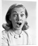 1960s head shot woman eyes and mouth wide open terrified expression looking at camera by Anonymous