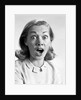 1960s head shot woman eyes and mouth wide open terrified expression looking at camera by Anonymous