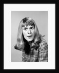 1960s head shot angry woman looking at camera by Anonymous