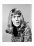1960s head shot angry woman looking at camera by Anonymous