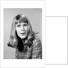 1960s head shot angry woman looking at camera by Anonymous