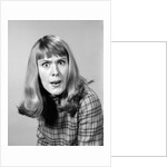 1960s head shot angry woman looking at camera by Anonymous