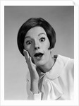 1960s brunette woman mouth agape eyes wide hand to cheek funny face expression shock surprise anger amazed by Anonymous