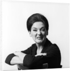 1960s 1970s brunette middle aged woman making funny face looking at camera with wrinkled nose and arms folded on back of chair by Anonymous