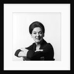 1960s 1970s brunette middle aged woman making funny face looking at camera with wrinkled nose and arms folded on back of chair by Anonymous