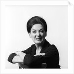 1960s 1970s brunette middle aged woman making funny face looking at camera with wrinkled nose and arms folded on back of chair by Anonymous