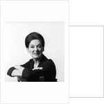 1960s 1970s brunette middle aged woman making funny face looking at camera with wrinkled nose and arms folded on back of chair by Anonymous