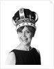 1970s smiling portrait woman wearing queen's crown looking at camera by Anonymous