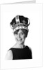 1970s smiling portrait woman wearing queen's crown looking at camera by Anonymous