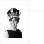 1970s smiling portrait woman wearing queen's crown looking at camera by Anonymous