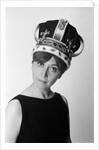 1970s portrait woman wearing queen's crown looking at camera by Anonymous