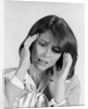1980s portrait woman hands massaging temple forehead headache distress stress by Anonymous