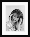 1980s portrait woman hands massaging temple forehead headache distress stress by Anonymous