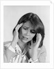 1980s portrait woman hands massaging temple forehead headache distress stress by Anonymous