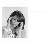 1980s portrait woman hands massaging temple forehead headache distress stress by Anonymous