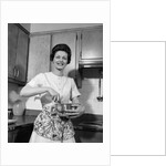 1960s woman kitchen housewife stir by Anonymous