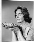 1950s 1960s woman smelling aroma of freshly baked pie by Anonymous