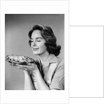 1950s 1960s woman smelling aroma of freshly baked pie by Anonymous