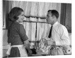 1960s man woman washing dishes kitchen sink by Anonymous
