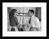 1960s man woman washing dishes kitchen sink by Anonymous
