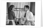 1960s man woman washing dishes kitchen sink by Anonymous