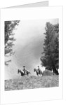 1950s 1960s two men on horseback riding across field wearing cowboy hats by Anonymous