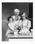 1940s 1950s mother daughter grandmother stuffing turkey by Anonymous