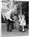 1960s children boy girl getting a balloon from man by Anonymous