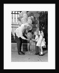 1960s children boy girl getting a balloon from man by Anonymous