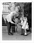 1960s children boy girl getting a balloon from man by Anonymous
