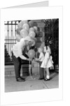 1960s children boy girl getting a balloon from man by Anonymous