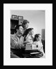 1960s happy family looking at slides on slide projector by Anonymous