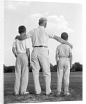 1960s back view grandfather with two grandsons boys by Anonymous