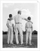 1960s back view grandfather with two grandsons boys by Anonymous