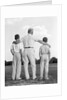 1960s back view grandfather with two grandsons boys by Anonymous