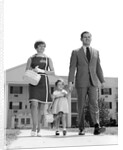 1960s 1970s family taking a walk sidewalk by Anonymous